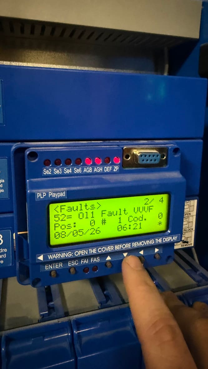 Engineer reading fault 011 VVVF on the lift controller's service display