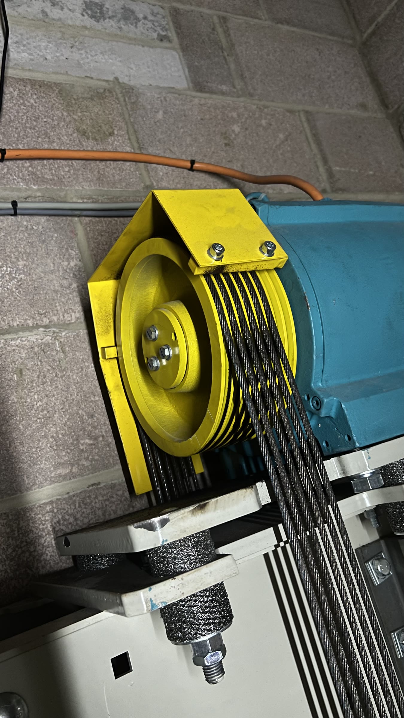 Well maintained modern lift machine with safety guards