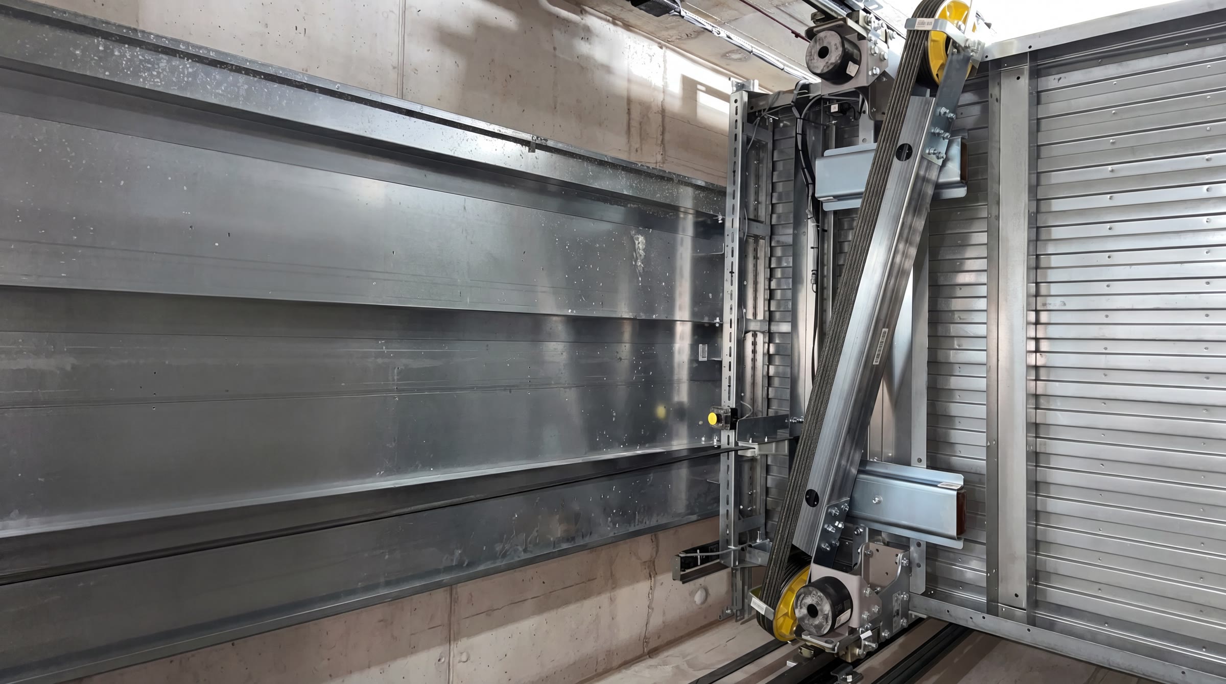 New lift installation with clean bright shaft panels